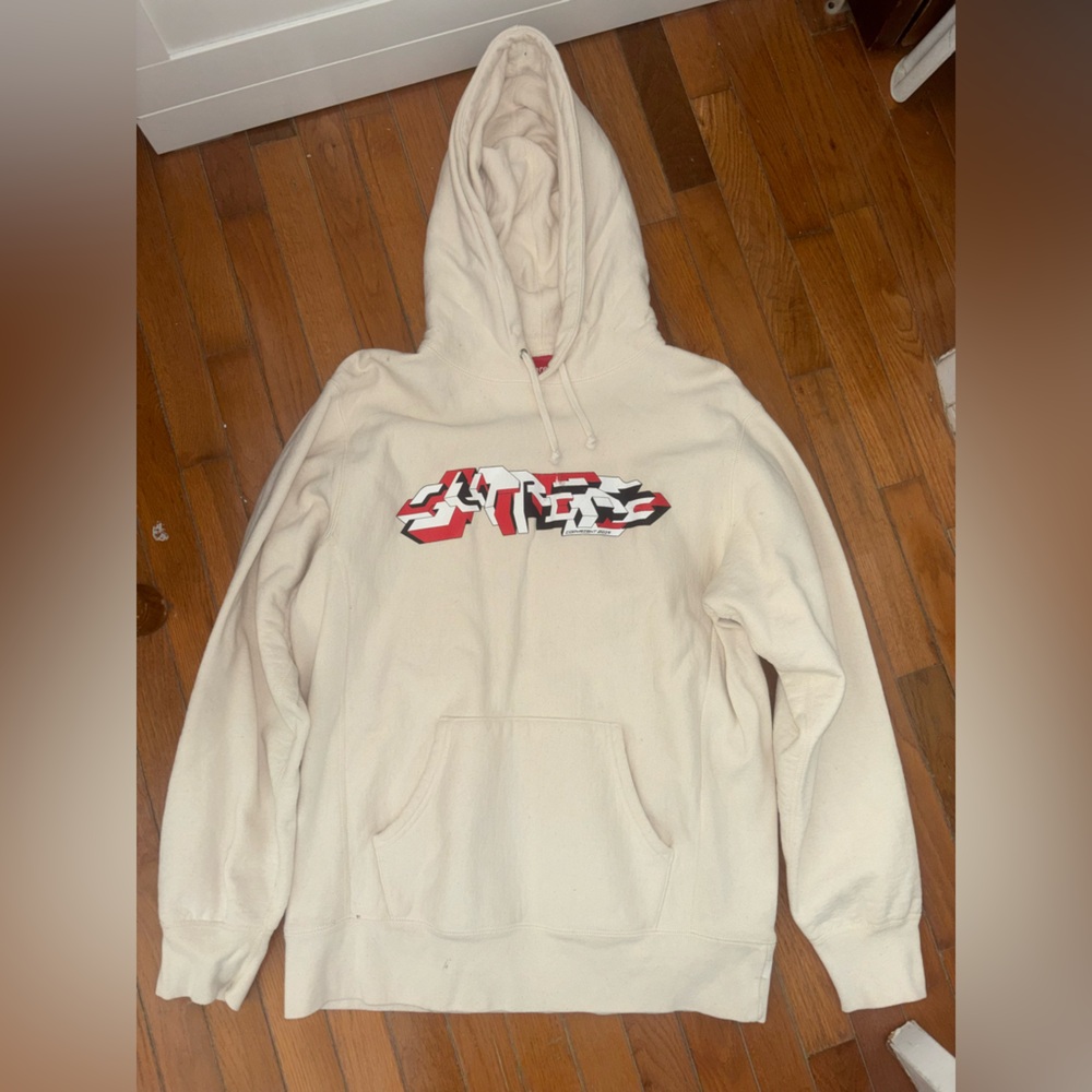 Supreme Cream Hoodie with Red Tag